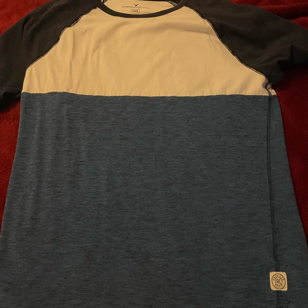 Black, blue and white american eagle tshirt.